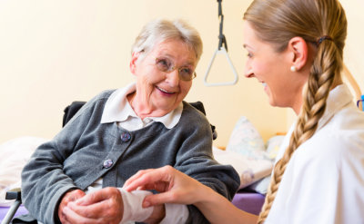 senior woman with her nurse